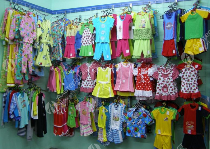 Магазин детских игрушек и одежды в торговом центре Фото - 1
