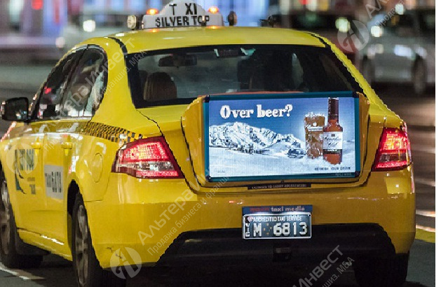 Рекламная печать на транспорте и такси с базой корпоративных клиентов.  Фото - 1