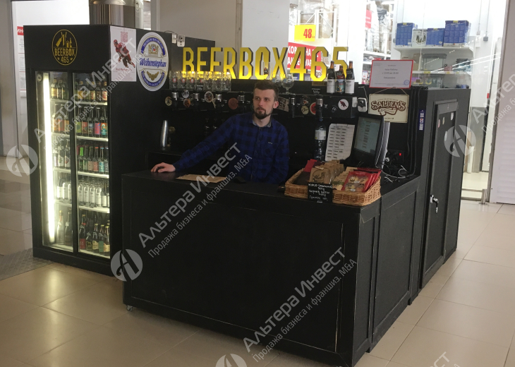 Магазин крафт-пива в ТЦ в прикассовой зоне Крупного ритейла Фото - 1