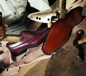 Мастерская по ремонту обуви в районе с высокой проходимостью