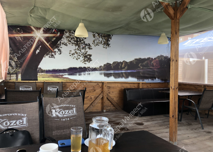 Кафе с летними беседками на берегу реки Фото - 11