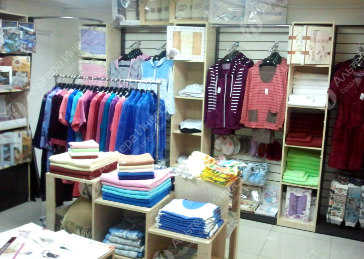 Прибыльный магазин одежды и текстиля Фото - 1