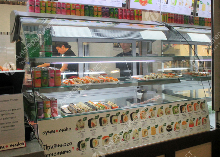 Магазин суши в густонаселенном районе города Фото - 1