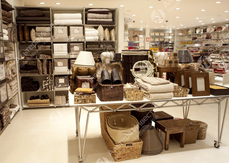 Магазин текстиля для дома и аксессуаров в крупном торговом центре Фото - 1