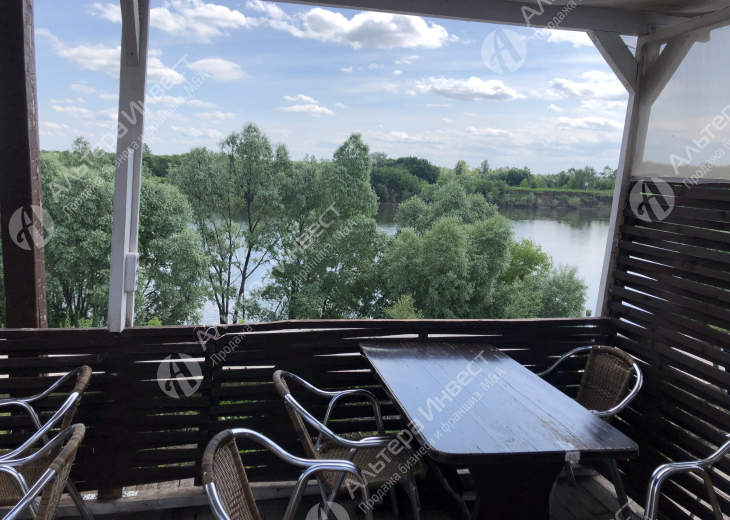 Кафе с летними беседками на берегу реки Фото - 2