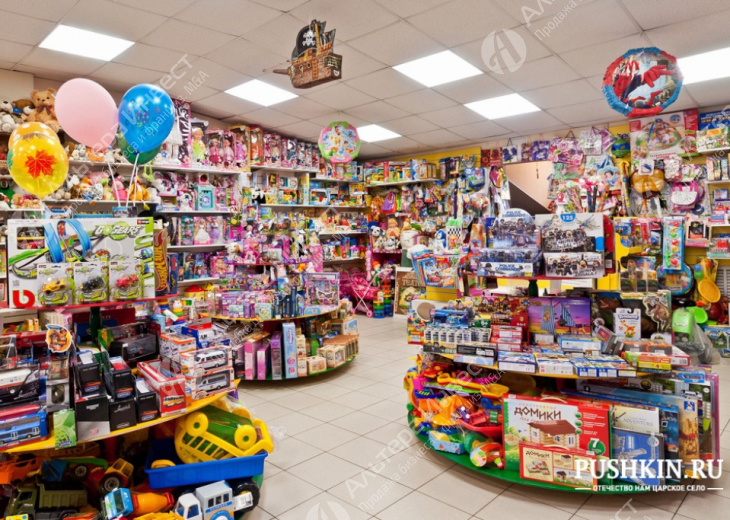 Магазин игрушек в кассовой зоне супермаркета Фото - 1