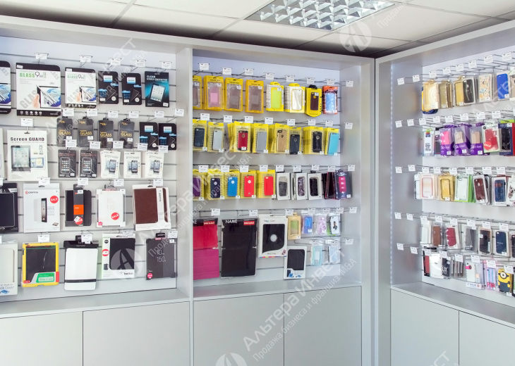 Салон по продаже мобильных телефонов и аксессуаров  + ремонт цифровой техники Фото - 1