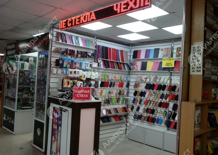 Магазин в ТЦ по продаже мобильных телефонов и аксессуаров  Фото - 5