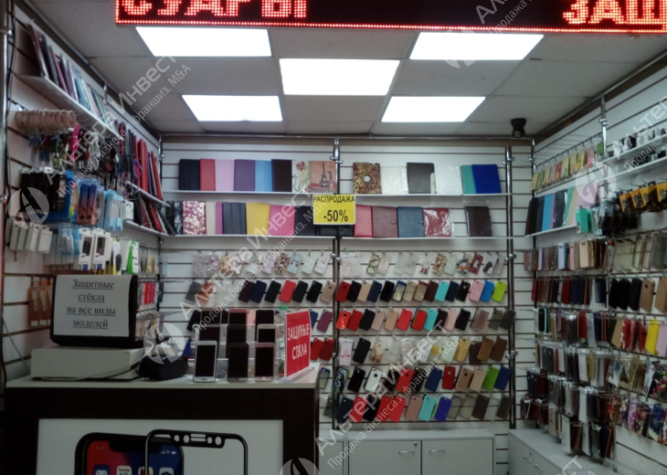 Магазин в ТЦ по продаже мобильных телефонов и аксессуаров  Фото - 2
